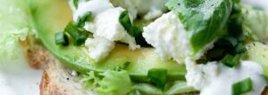Avocado, white cheese and sour cream sandwich