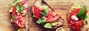 Sandwich with avocado, tomato and basil