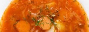 Cabbage soup with young cabbage and tomatoes