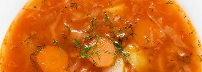 Cabbage soup with young cabbage and tomatoes