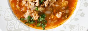 Cabbage soup with young cabbage, green lentils and turkey