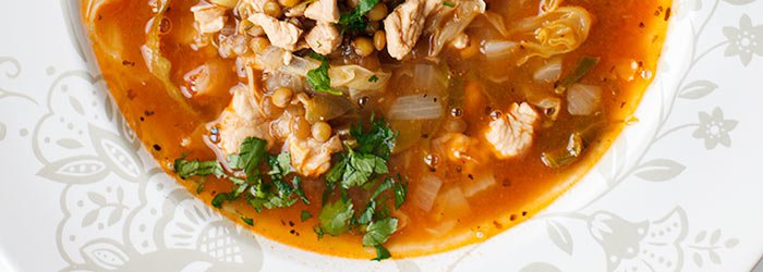 Cabbage soup with young cabbage, green lentils and turkey