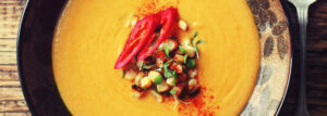 Creamy corn soup with coconut milk, ginger and turmeric