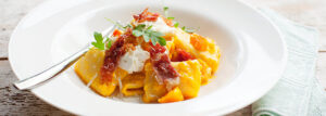 Makaron z dynią, szynką parmeńską i ricottą