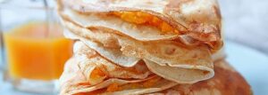Pancakes with pumpkin and white cheese