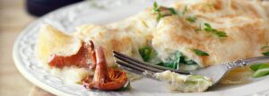 Herbed omelet with chanterelles and camembert cheese