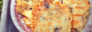 Cheese pancakes with apples, cinnamon and raisins