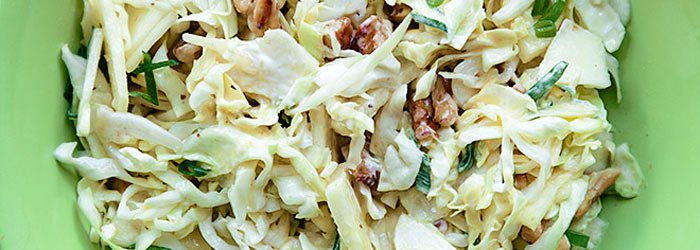 Salad with white cabbage, pineapple and walnuts