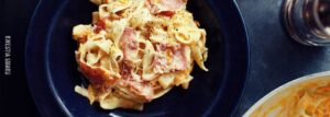 Tagliatelle z szynką parmeńską, tartą dynią i kremowym sosem z pomarańczą