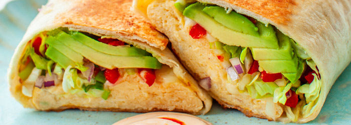 Breakfast wrap with omelet and avocado