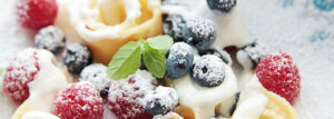 Pancake ribbons with cream and fruit