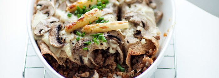 Baked buckwheat pancakes with ground meat and buckwheat groats