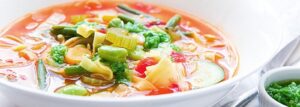 Vegetable soup with pesto and pasta