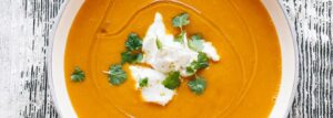 Cream sweet potato soup with ricotta