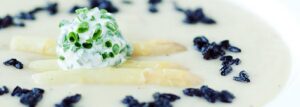 Creamy white asparagus soup with coconut milk