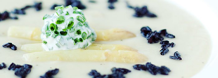 Creamy white asparagus soup with coconut milk