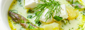 Asparagus soup with potatoes and feta
