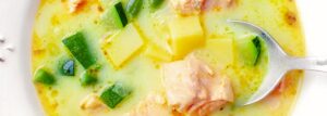 Soup with salmon, potatoes and zucchini